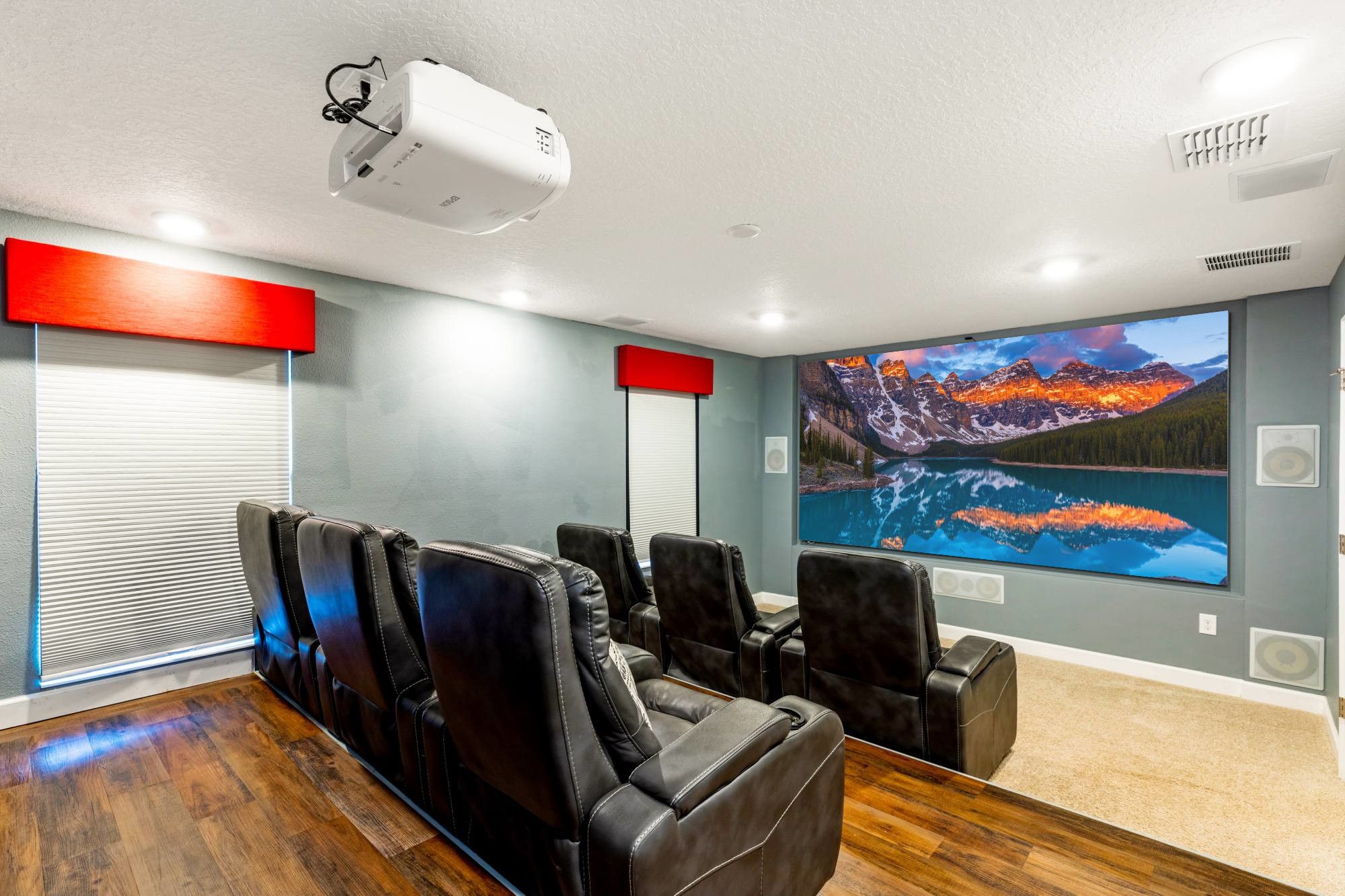 Private movie theater with a 135-inch screen and 10 power recliners at a Champions Gate villa Private movie theater with a 135-inch screen and 10 power recliners at a Champions Gate villa